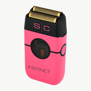 Instinct Metal Professional Double Foil Shaver side angle with gold top on a white background