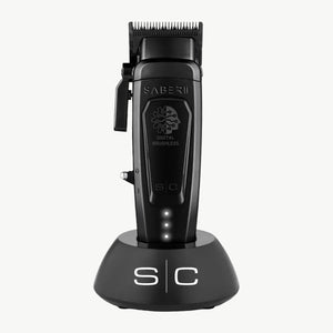 Black metal Saber 2 digital brushless clipper in charging base