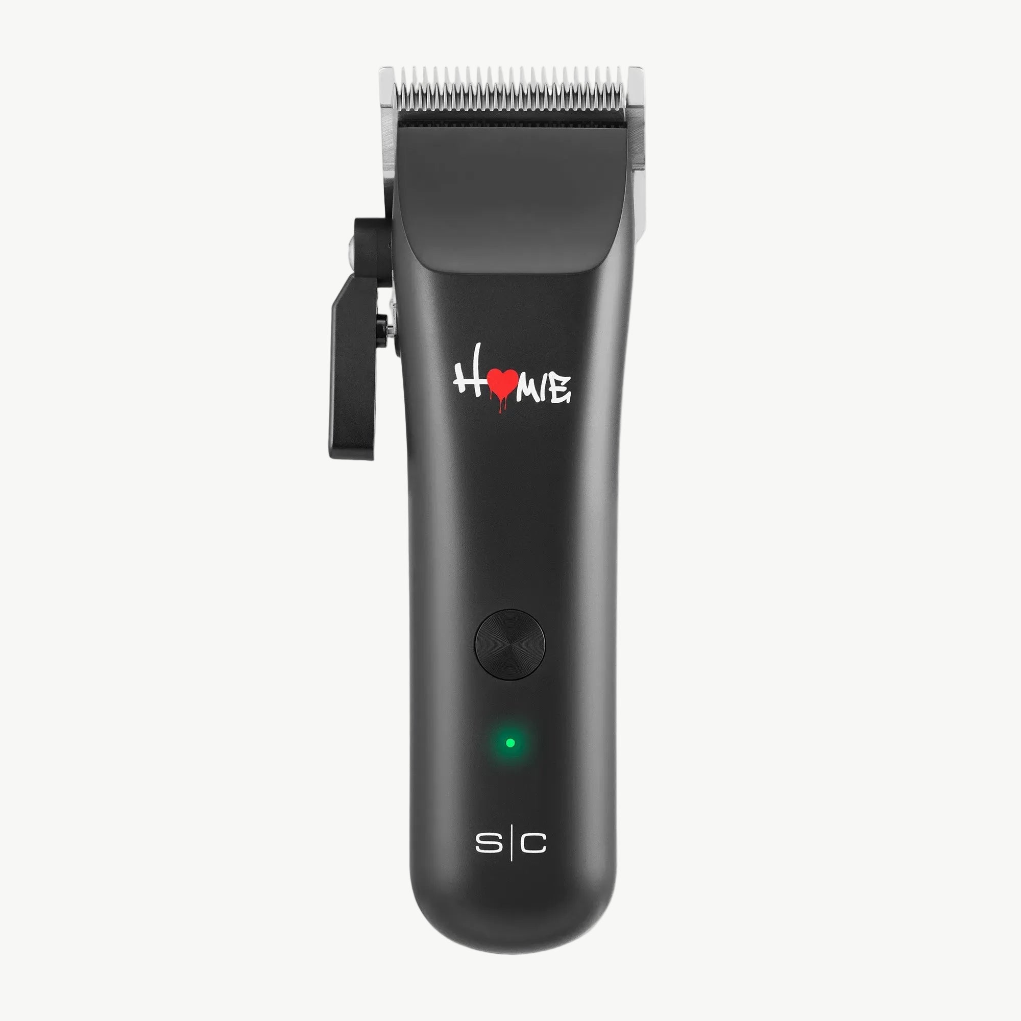 Homie Nano Hair clipper with a silver metal blade and a black guard clip, featuring the 'Home' logo with a red heart and 'SIC' branding on the handle, shown against a plain white background.