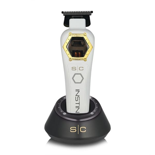 Instinct Metal Trimmer with I N 2 Vector motor with white lid in charging base.