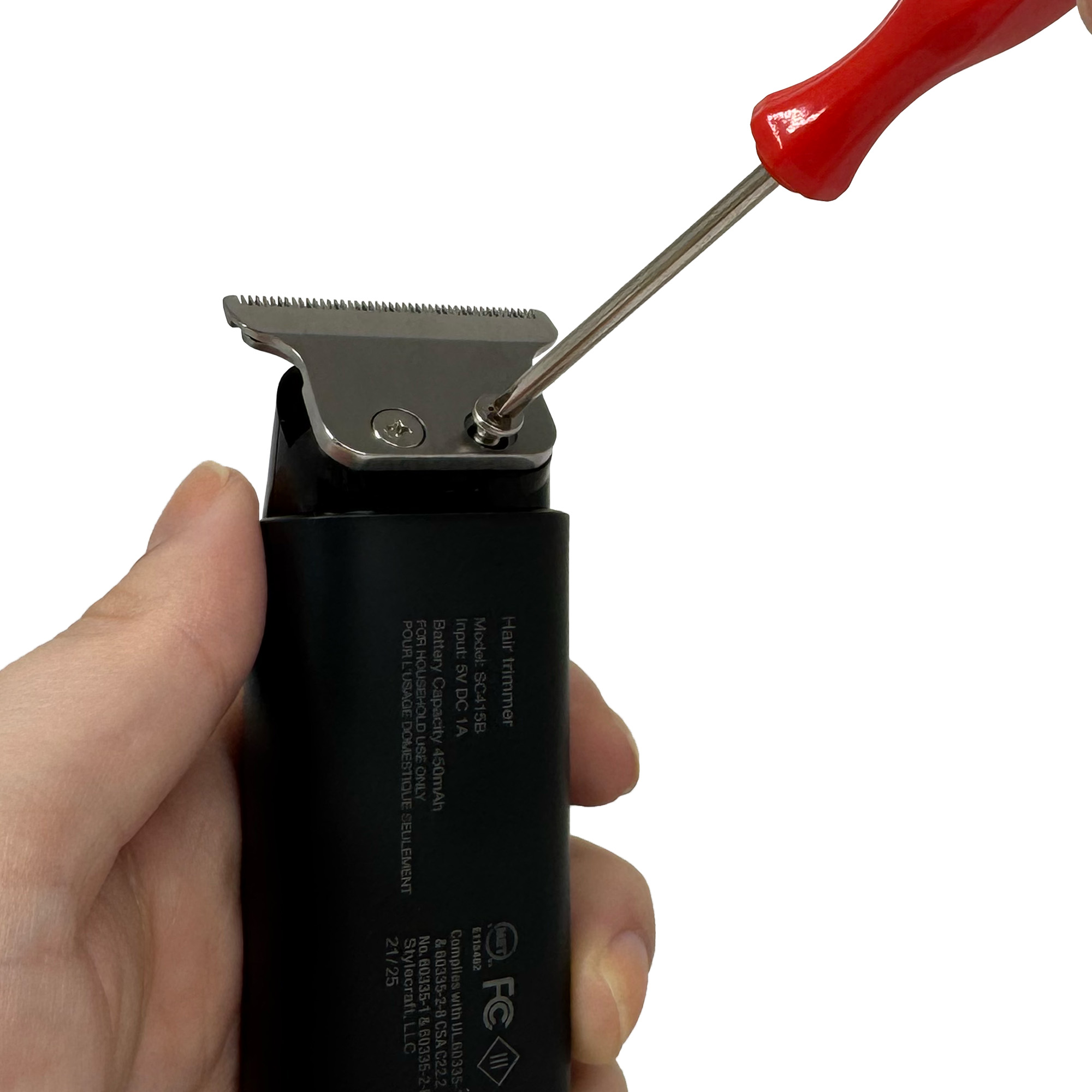 Image of the trimmer in black and gold in charging stands