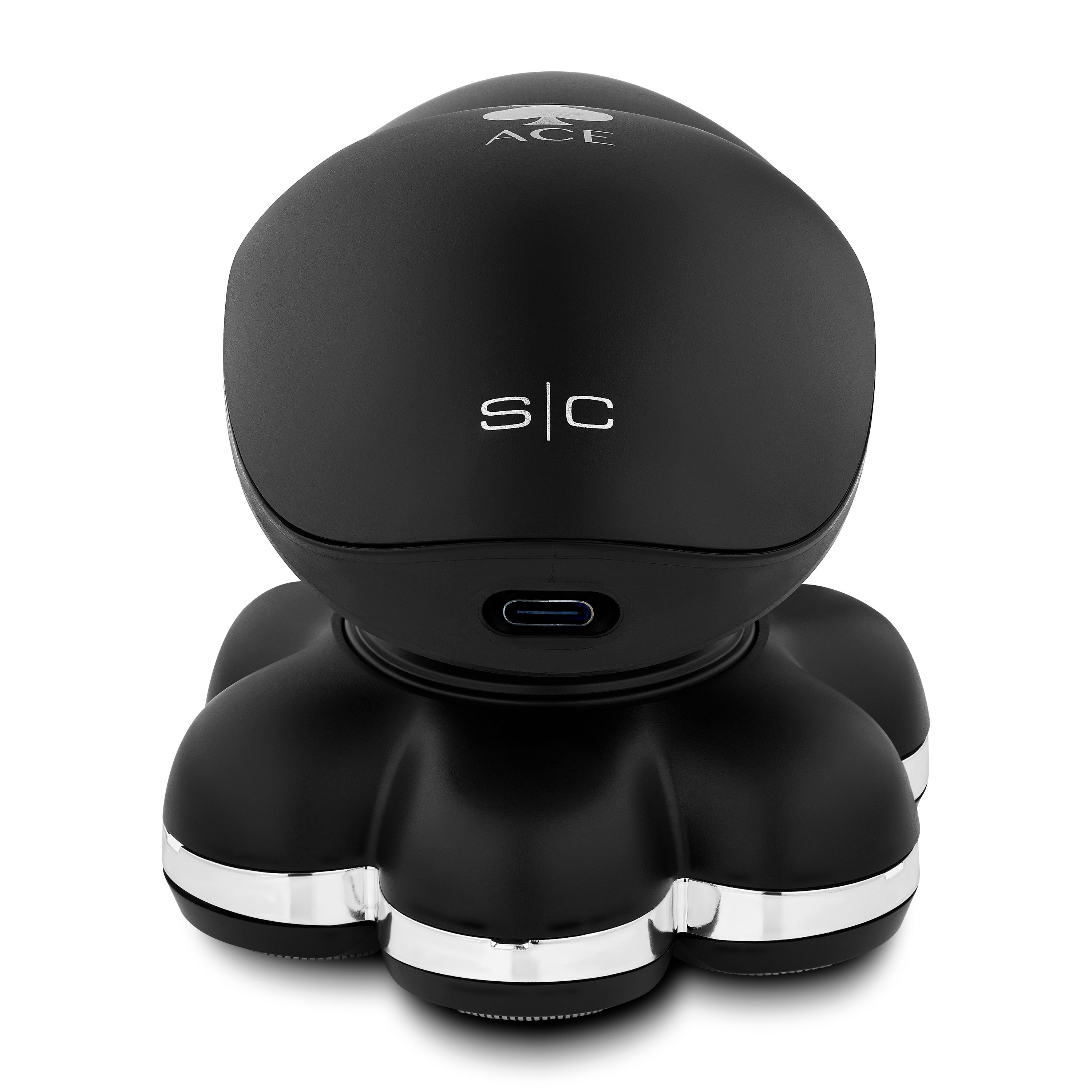 Image of the trimmer in black and gold in charging stands